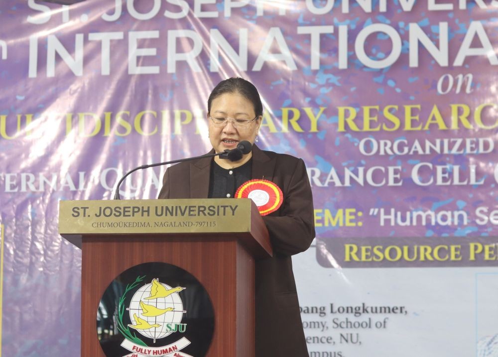 V Lovitoly Sema, Additional Secretary of Higher and Technical Education and ex-officio Director of Higher Education addreses the inaugural session of the 4th ICMRI at St Joseph University, Chümoukedima, on October 26. (Photo Courtesy:  SJU)